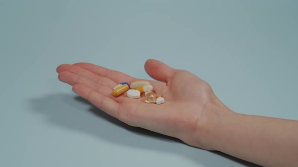 Handful of tablets and capsules