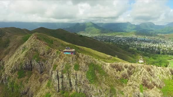 Pullback aerial view of Lanikai pillbox on Oahu Hawaii on a sunny day