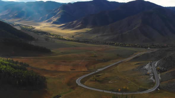 Beautiful Views of the Mountains, Forests and Road of Altai in the Fall on a Sunny Day