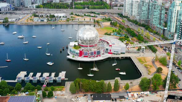 Aerial View Of Science World Museum With Leisure Boats On False Creek In City Of Vancouver, Canada.