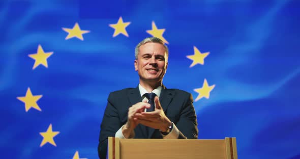 Happy Politician Applauding and Waving Hand