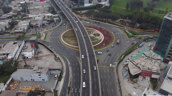 Drone footage of newly built overpass in Lima, Peru above a roundabout called "Ovalo Monitor Huascar