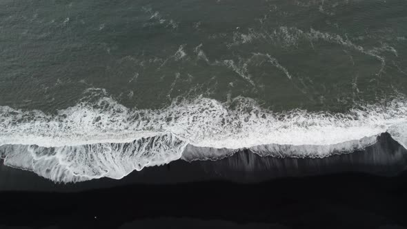 Drone Shot Of White Tide On Black Sand Beach