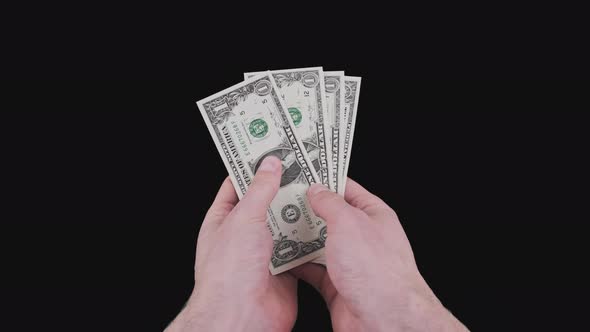 Male Hands Show Several One Dollar Bills with Alpha Channel