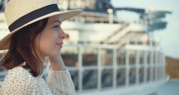 Smiling young passenger on a ship