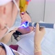 Dentist is Checking Patient's Teeth with Ultraviolet - VideoHive Item for Sale