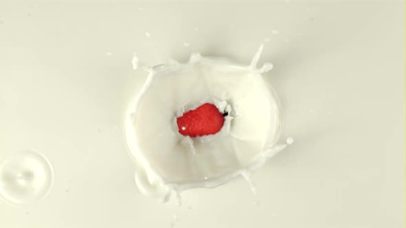 Super Slow Motion of Strawberries Falls Into the Milk