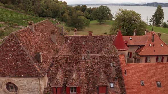 Aerial of beautiful old building, tilting down to courtyard