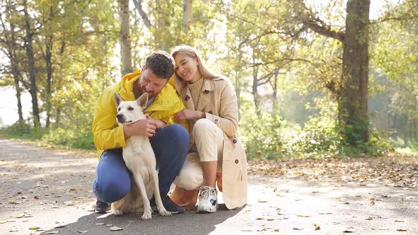 Happy Man Hugs His Beloved Dog He Enjoys Walk His Wife Dog Autumn Beautiful Forest