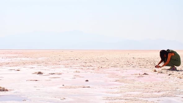 Woman Take Photo Of Dry Salt Lake