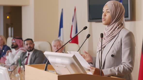Muslim Female Political Leader Making Speech at Press Conference