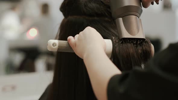 Hair Care In Fashion Studio. Beautiful Young Woman.