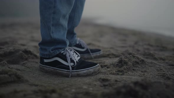 Stylish Guy Sneakers Standing Sandy Beach