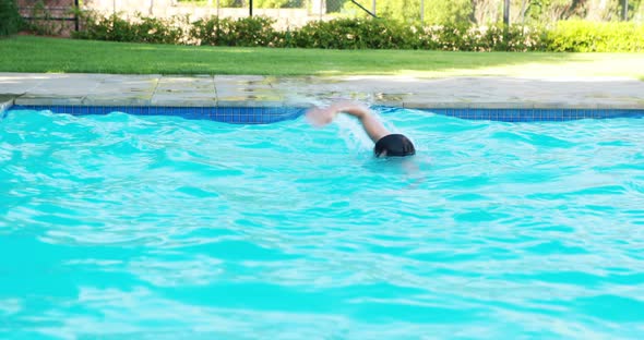 Man swimming in the pool