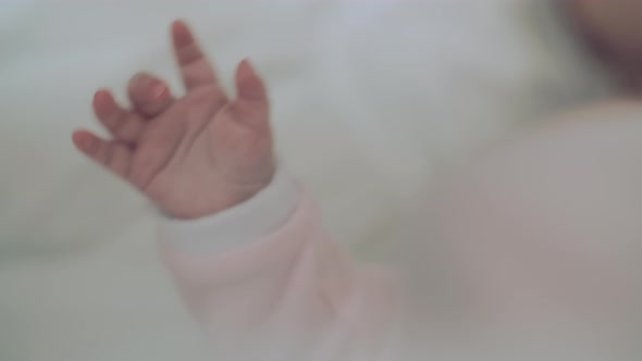 A Closeup of a Tiny Babys Hand