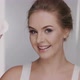 Woman Wiping Her Face and Showing Cotton Pad To the Camera - VideoHive Item for Sale