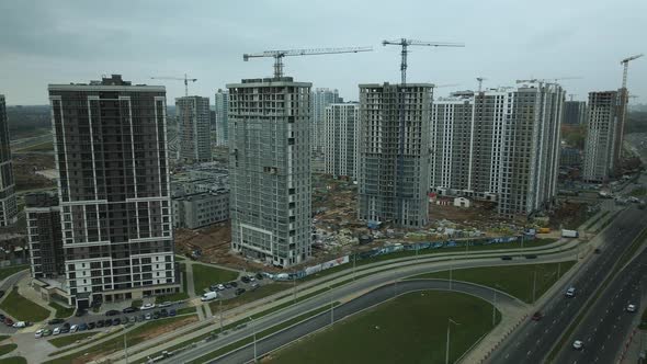 Construction of modern multi-storey buildings. Construction of a new city block.