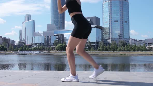 Woman working out in city