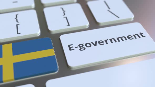Electronic Government Text and Flag of Sweden on the Keyboard