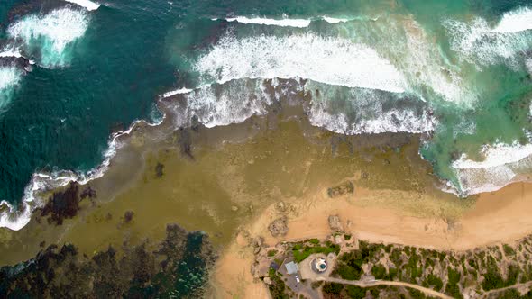 Waves Crashing on Coast - Aerial View