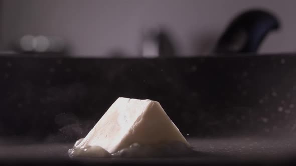 Triangular Butter Fall on Frying Pan