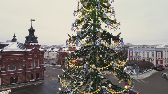 Tall Fabulous New Year Tree on the City Square Aerial View