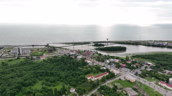 Anaklia, Georgia - July 16 2022: Aerial view of Anaklia-Ganmuhkuri Pedestrian Bridge at sunset