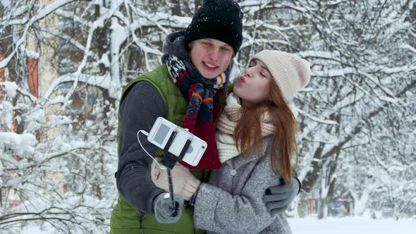 Happy Couple Doing Selfie Outdoors