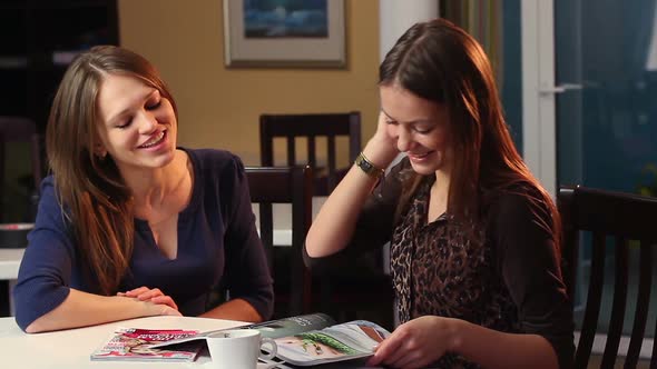 Beautiful Ladies Chatting in Cafe Smiling Reading Magazine Laugh