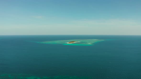 Travel Concept with a Sandy Beach and Blue Sea