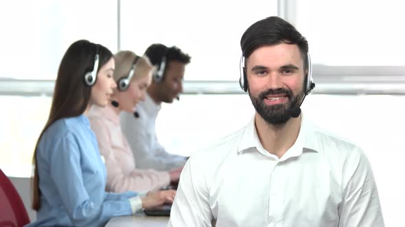 Young Man with Beard in Office, Bright Room