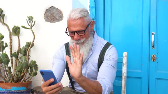 Senior Man with a Phone