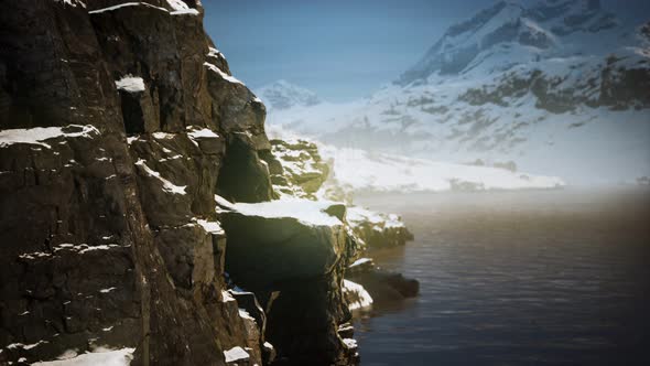 Snow Covered Mountains in Northern Ocean