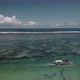 Aerial View of Traditional Indonesian Boat in Turquoise Crystal Clear Water  - VideoHive Item for Sale