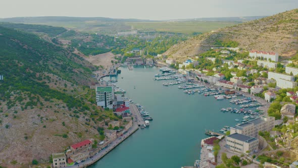 Aerial Photography of the Sea Harbor with Yachts and Buildings