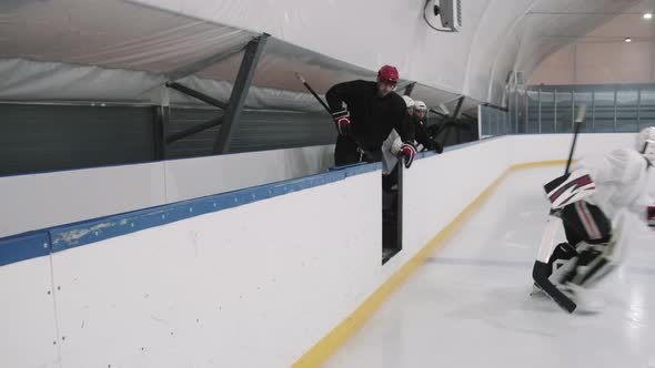 Energetic Hockey Players Going Out On Ice Rink