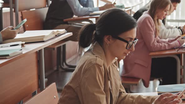 Multi-Ethnic Students with Smartphones in Lecture Hall