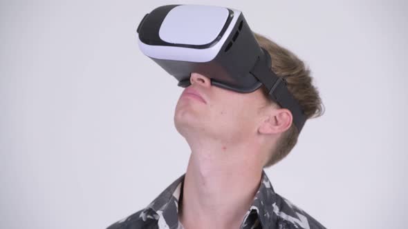 Face of Young Tourist Man Using Virtual Reality Headset