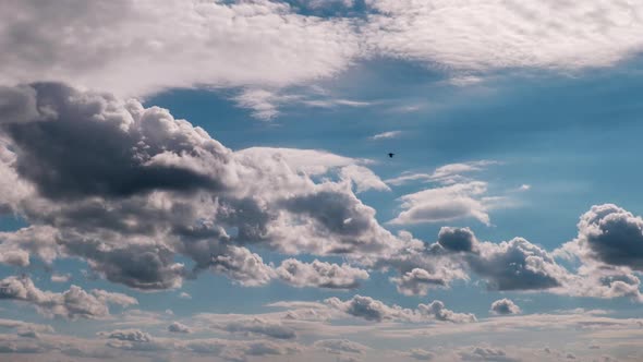 Timelapse of Puffy Clouds Moving in the Blue Sky Cloud Space