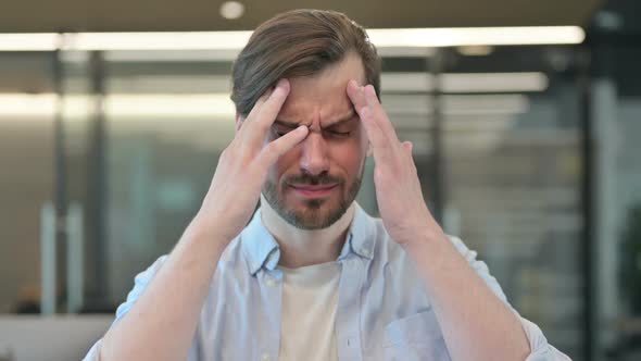 Tense Mature Adult Man Having Headache Portrait