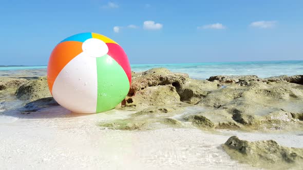 Tropical flying copy space shot of a sandy white paradise beach and aqua blue ocean background in hi