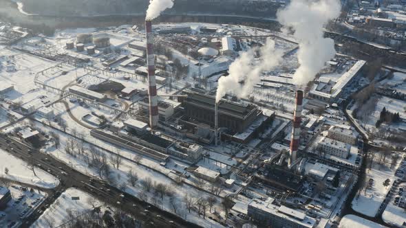 Factory polluting air during winter