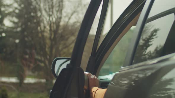 Handsome African Male Driver Getting Out From Car