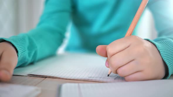 Closeup School Pupil Male Writing Letter on Paper Notebook