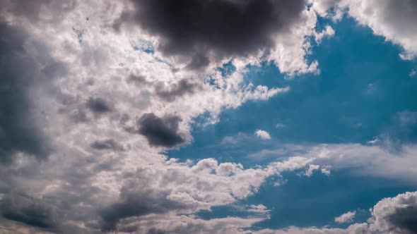 Timelapse of Puffy Clouds Moving in the Blue Sky Cloud Space