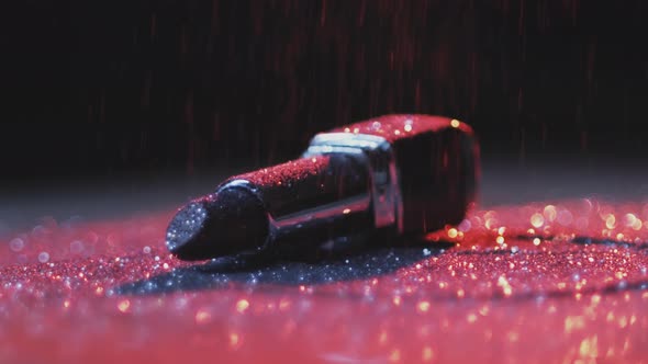 Lipstick and Glitter Illuminated with Neon Lights