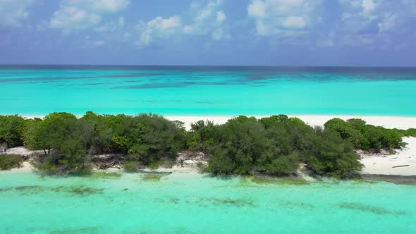 Beautiful flying island view of a white sandy paradise beach and aqua blue water background in high 