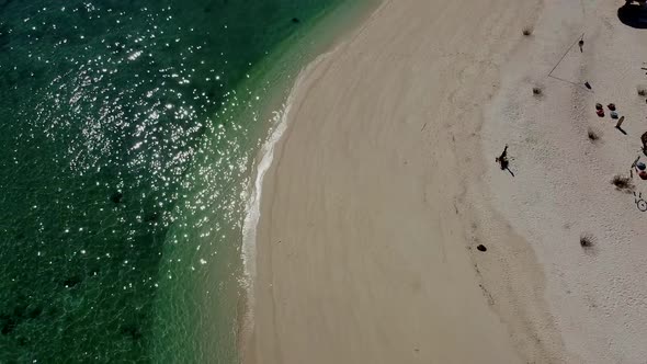 Aerial Top View on Beautiful Green Ocean on Beach with White Sand in Thailand