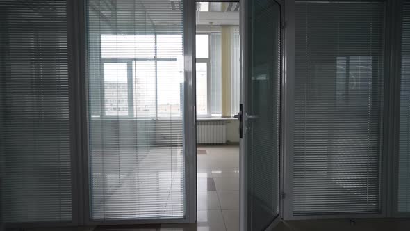 Live Camera Entering Empty Office with No Furniture for Rent