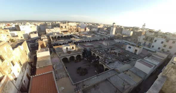 Fishmarket, also named spice market in Essaouira Morocco in a time lapse under overcast clouds